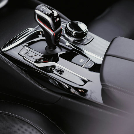 How to properly clean and care for piano black surfaces in the car