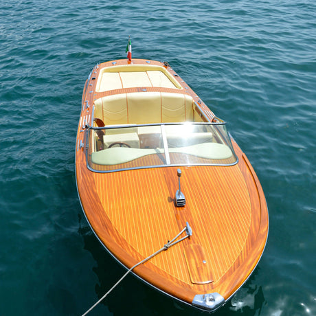 How do you properly care for wooden boats?